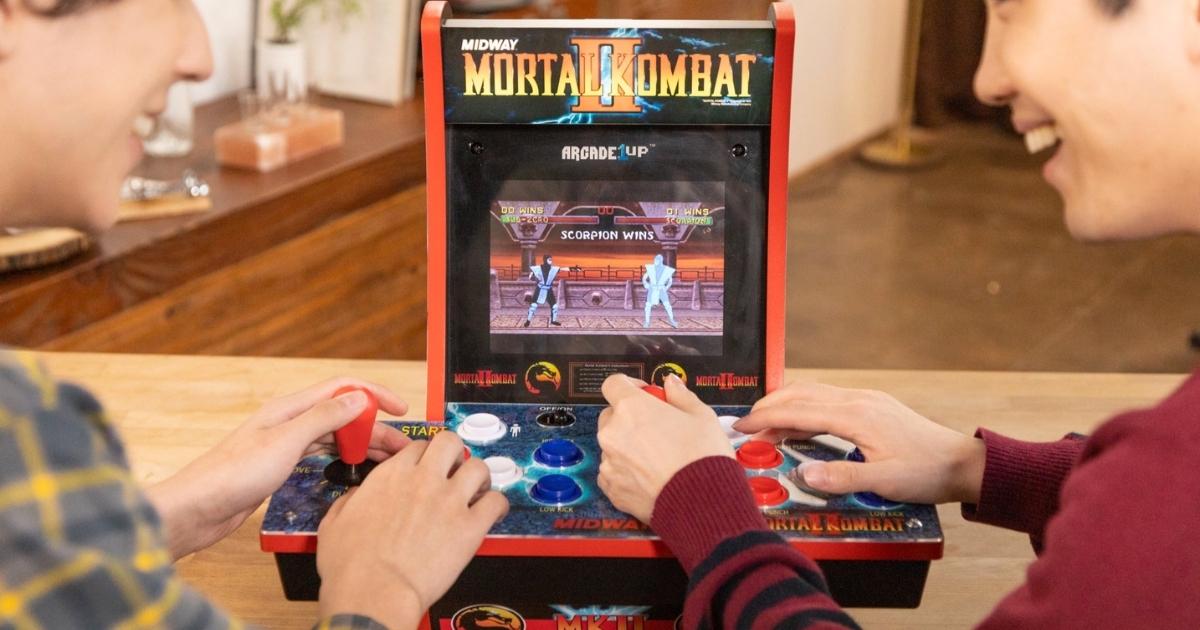 kids playing arcade1up mortal kombat countercade game