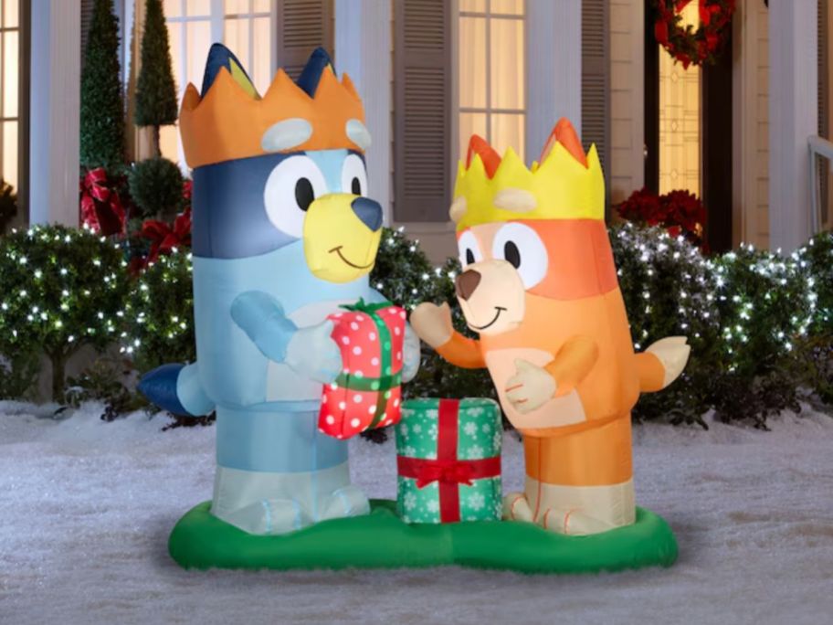 Bluey and Bingo Christmas Inflatable on a lawn