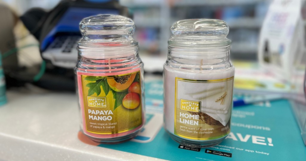 two jar candles at register in store