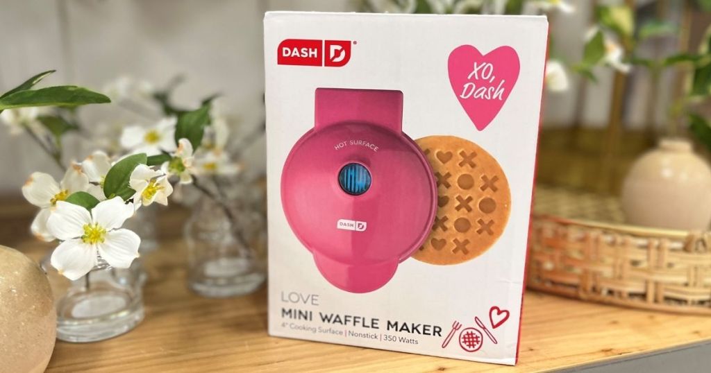 Dash Love Waffle Maker surrounded by flowers