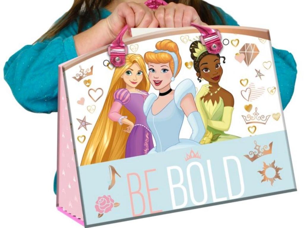 girl holding disney princess activity and craft tote