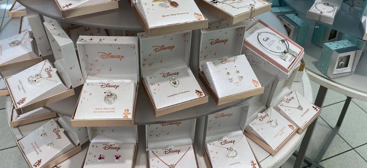 Disney jewelry at Kohls on a display table