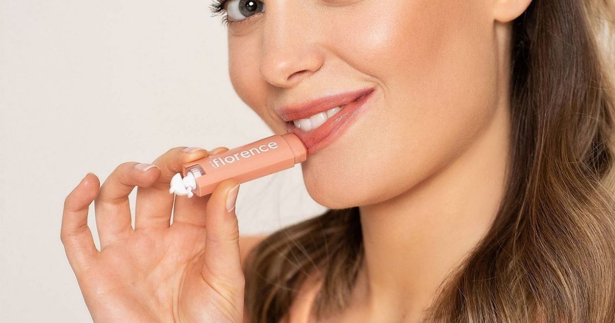 woman using Florence by mills Oh Whale! Tinted Lip Balm