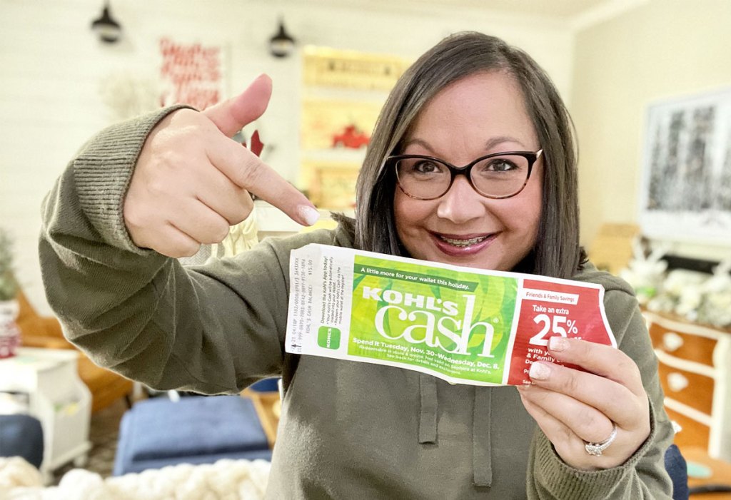 woman pointing at kohl's cash