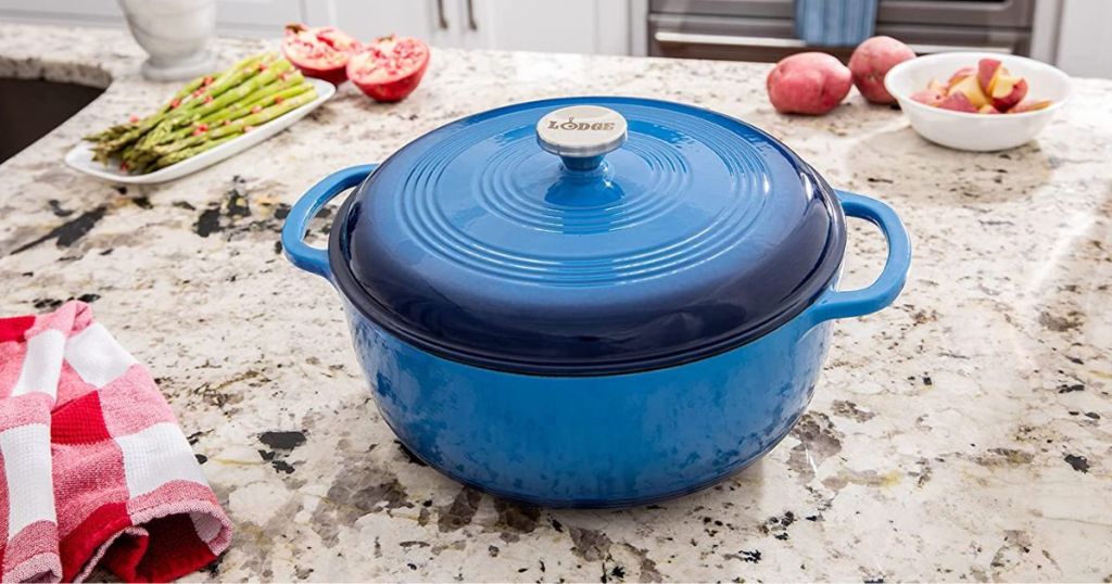 blue cast iron Dutch Oven on marble countertop