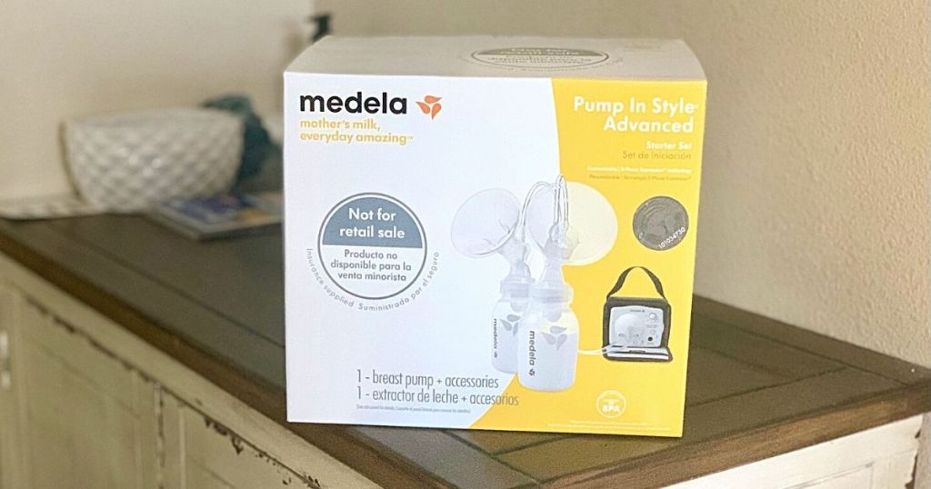 Medela breast pump sitting on table