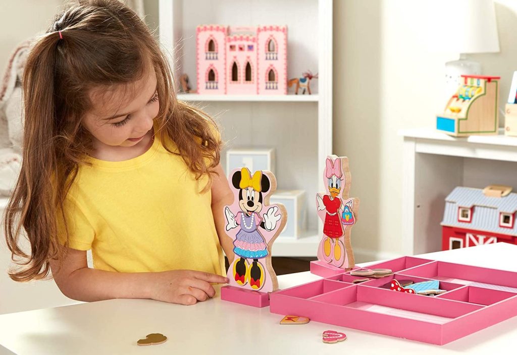 Melissa & Doug Disney Minnie Mouse and Daisy Duck Magnetic Dress-Up Wooden Doll Pretend Play Set