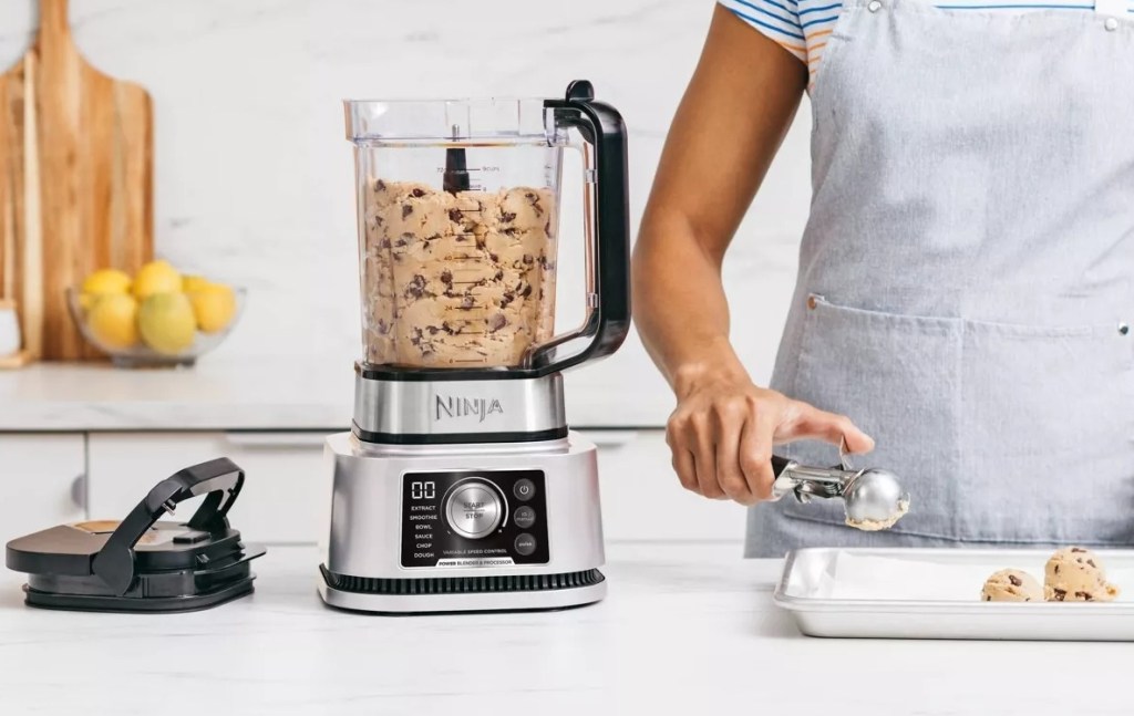 blender with cookie dough in it