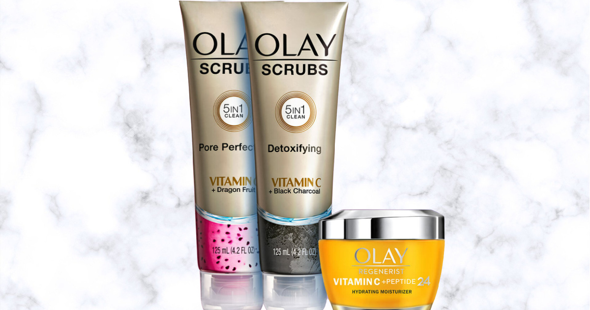 two olay face scrubs and moisturizer in an orange jar