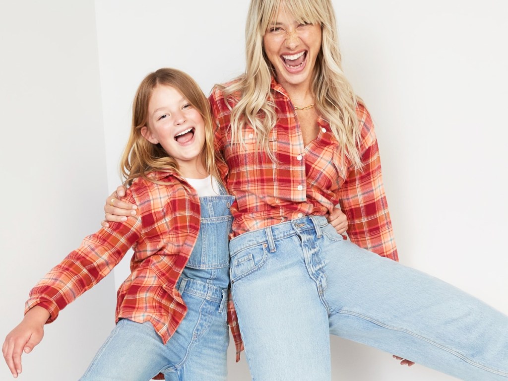 mom and daughter in matching flannels