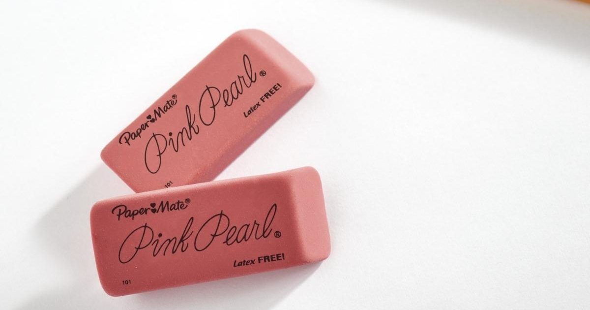 paper mate pink pearl erasers on paper with pencil