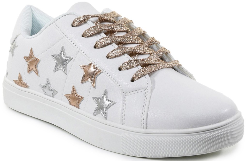 white sneakers with silver and gold stars