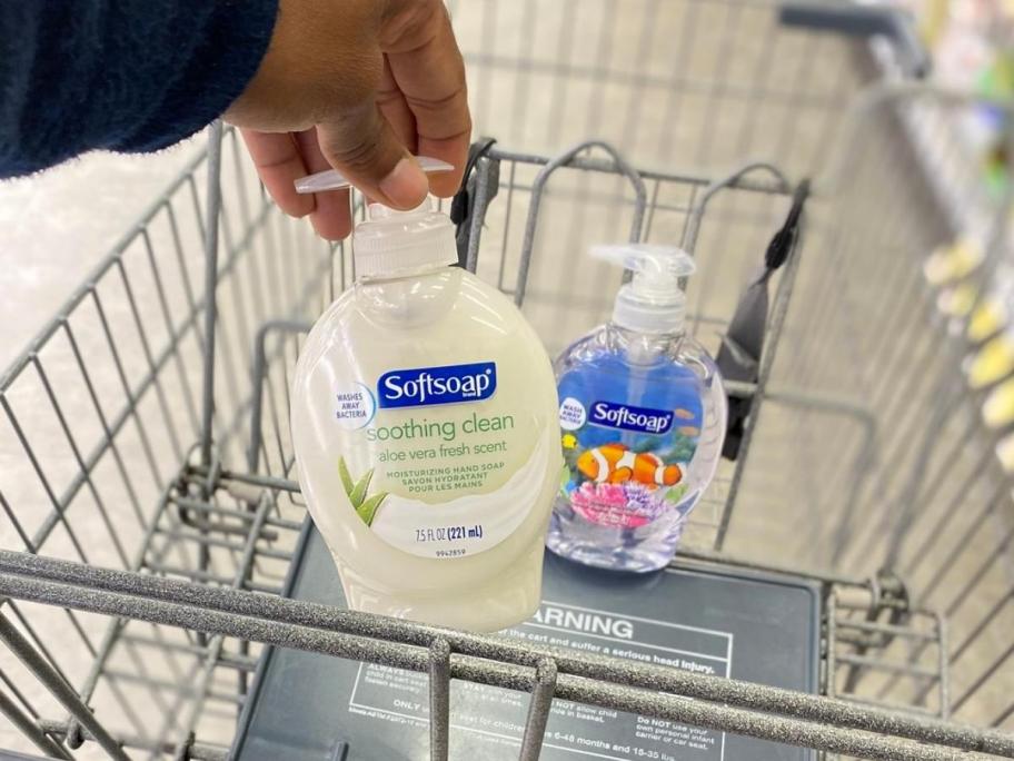 hand holding softsoap liquid hand soap in cart