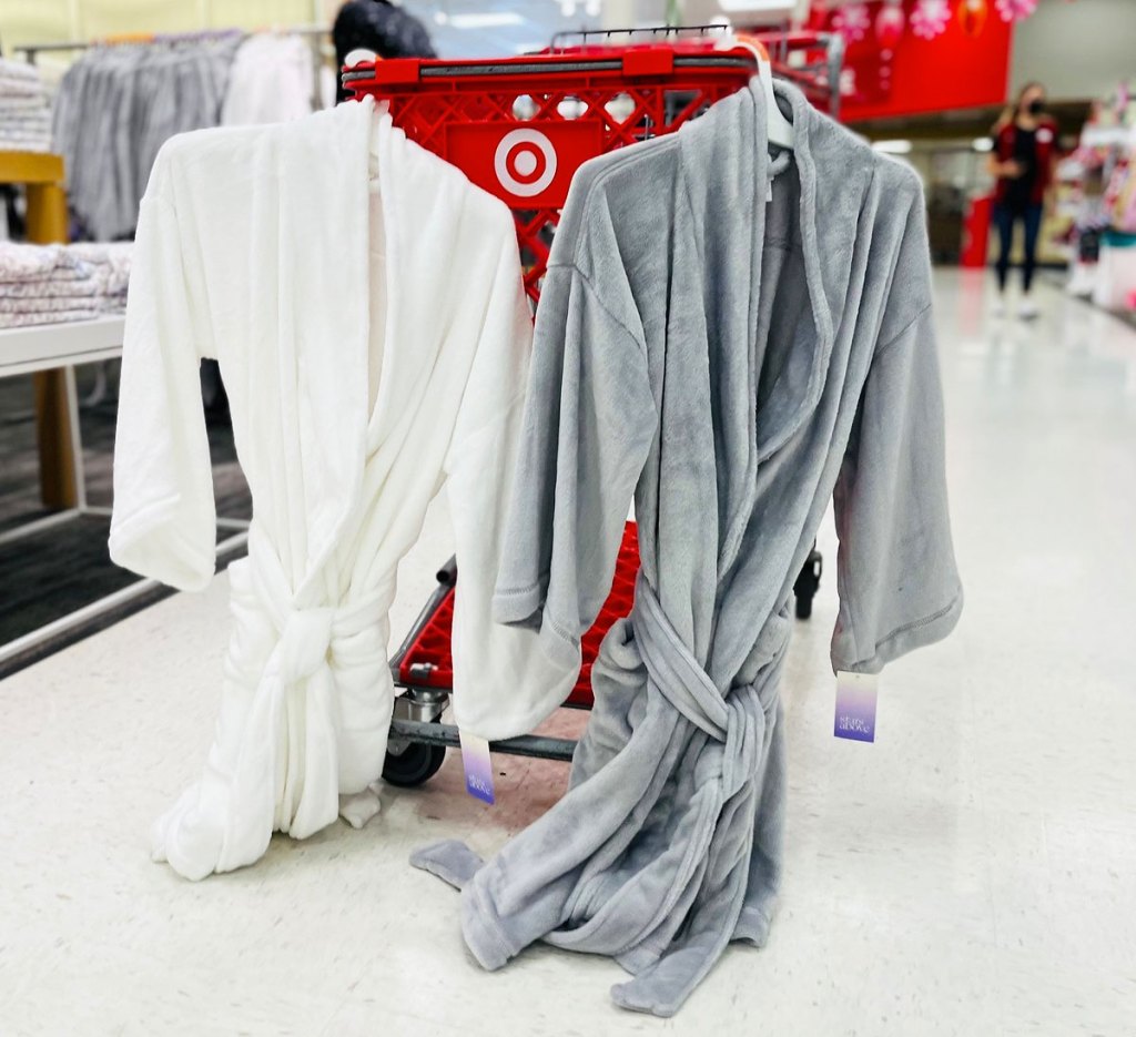 two robes hanging on target cart