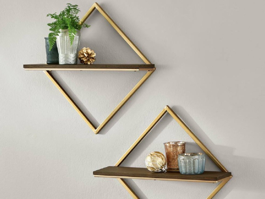 2 triangle shaped shelves on wall