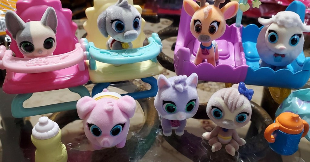 Little plastic animal toys on coffee table