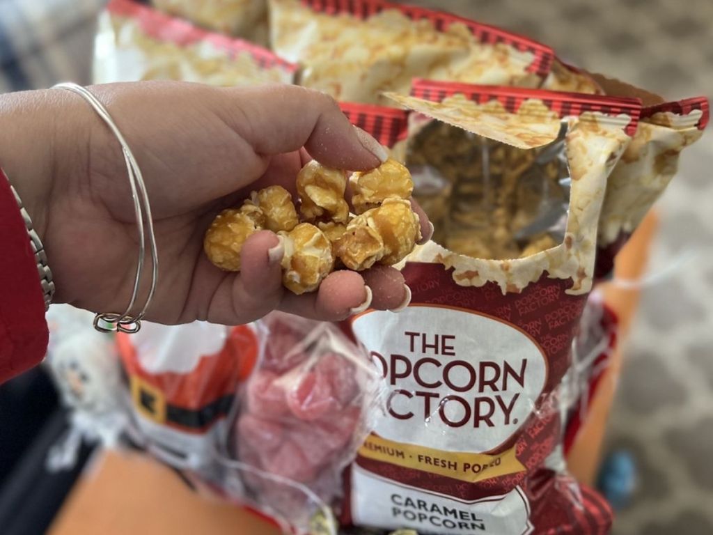 hand holding popcorn