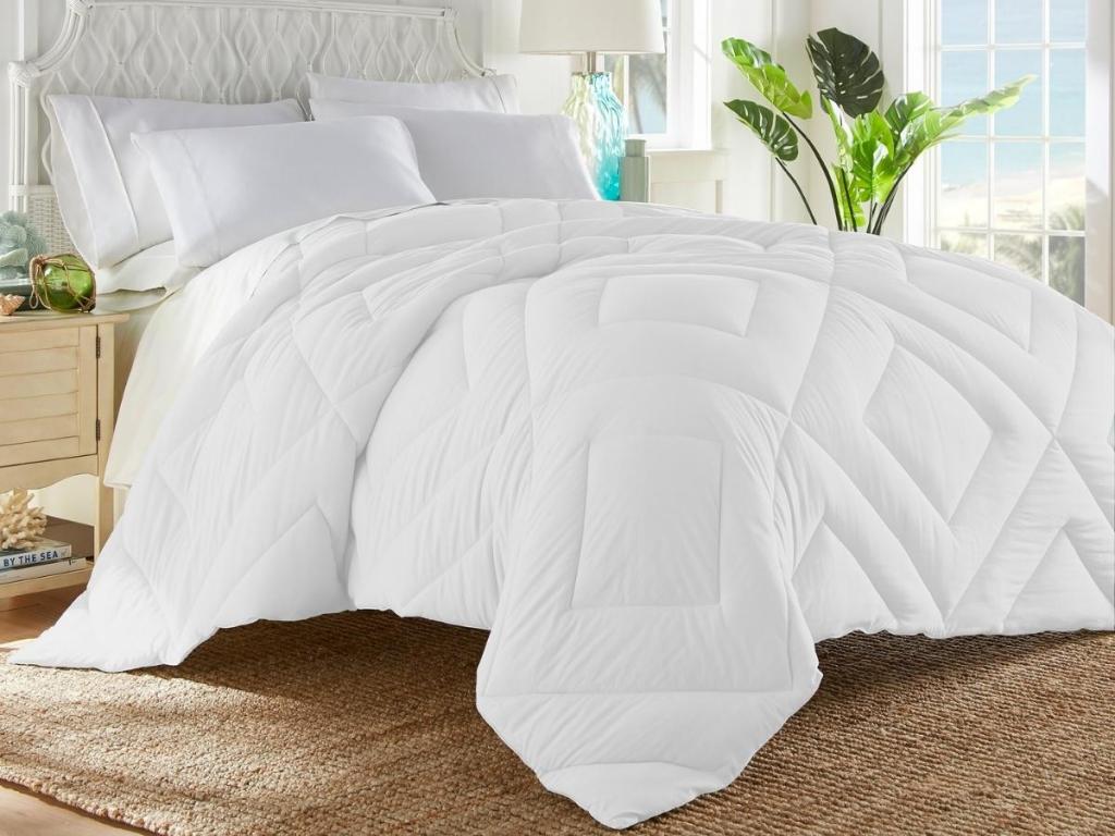 tommy bahama waterwashed down alternative comforter on bed