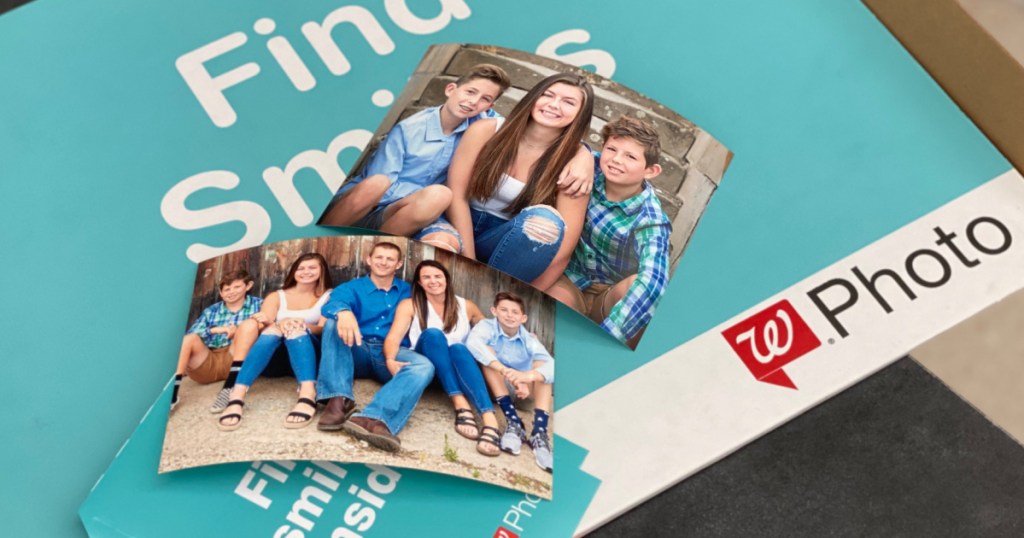 photo prints of family on top of Walgreens photo envelopes