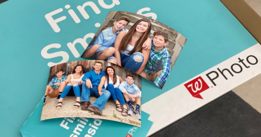 photo prints of family on top of Walgreens photo envelopes