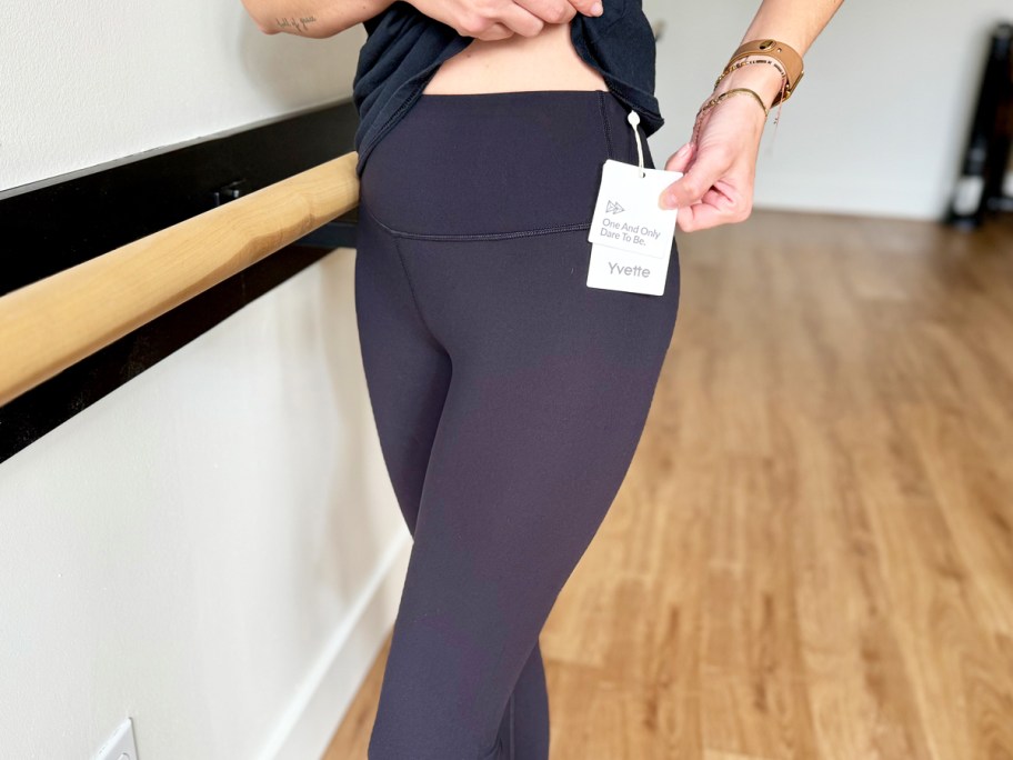 woman wearing a pair of black leggings