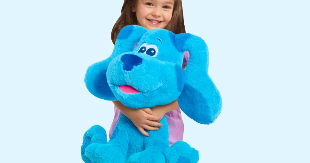 girl hugging Blue plush from Blues Clues and You