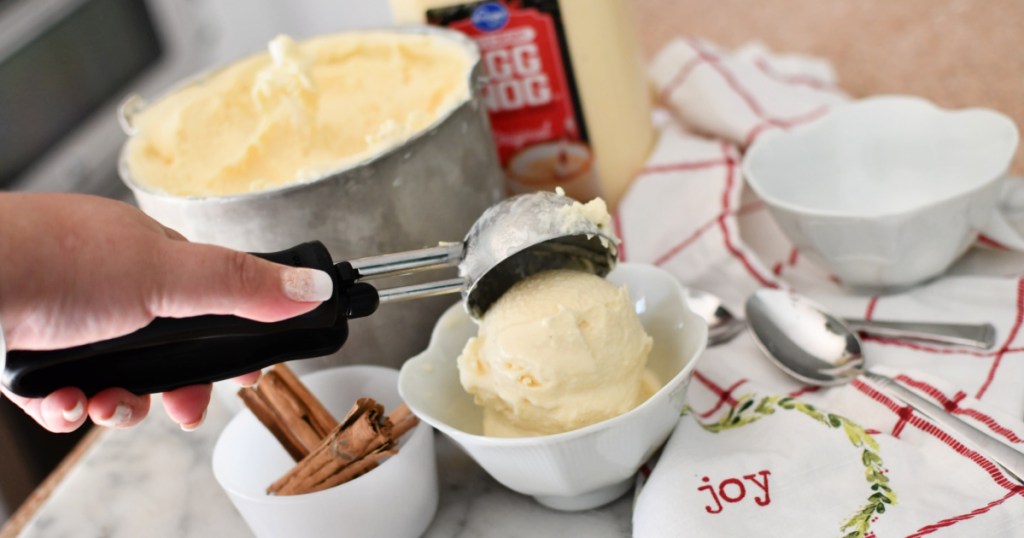dishing up ice cream in a bowl