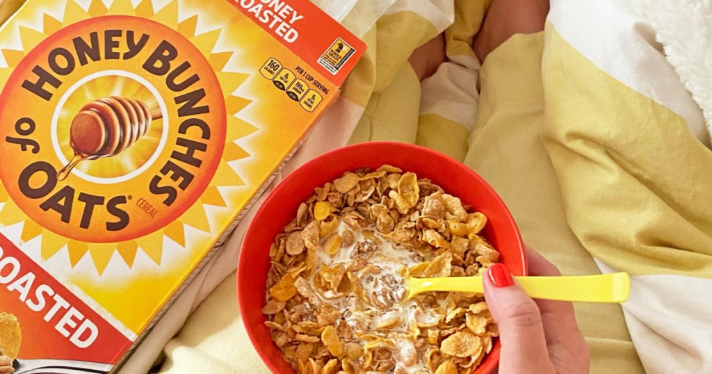 bowl of cereal next to a cereal box