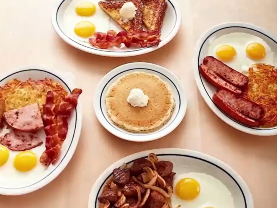 four IHOP meals with pancakes in the middle