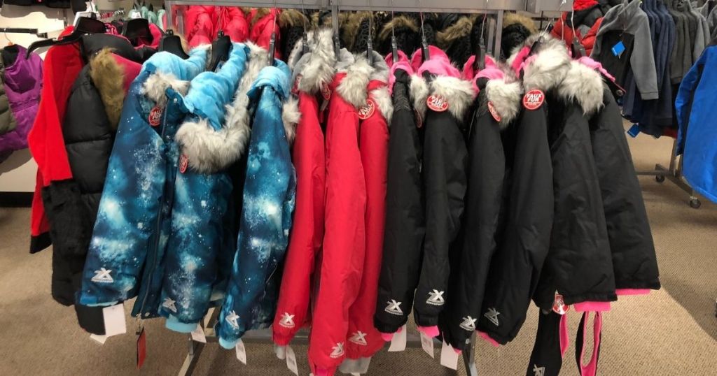 women's jackets on rack in store