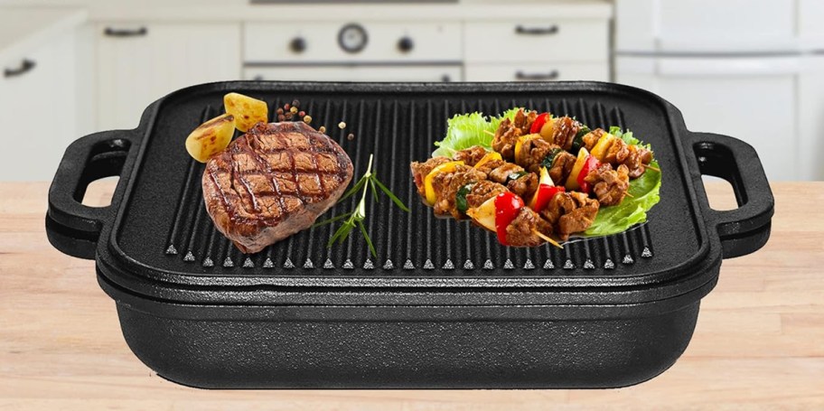 cast iron skillet with steak and veggies