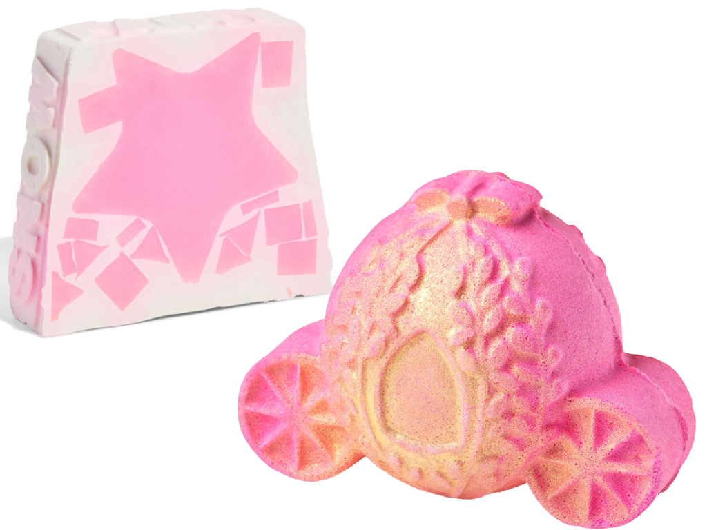 2 pink and white bath bombs on white background