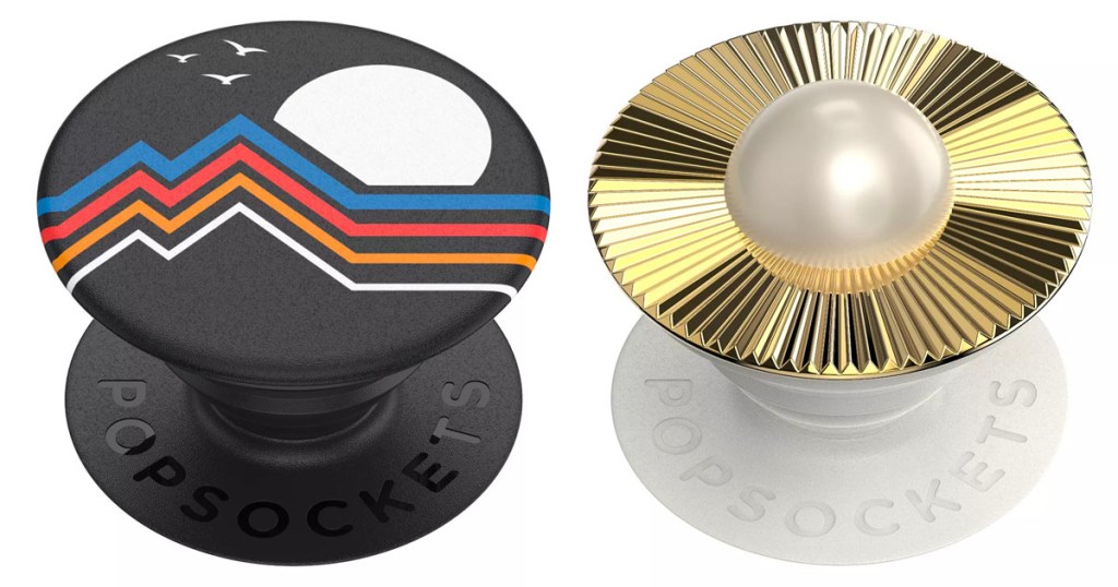 two popsockets one black with mountains and one gold