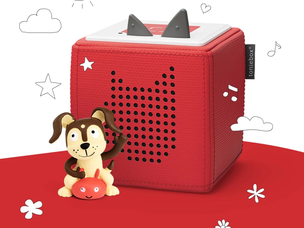 red toniebox against a stock background with a toy puppy resting against the front of it