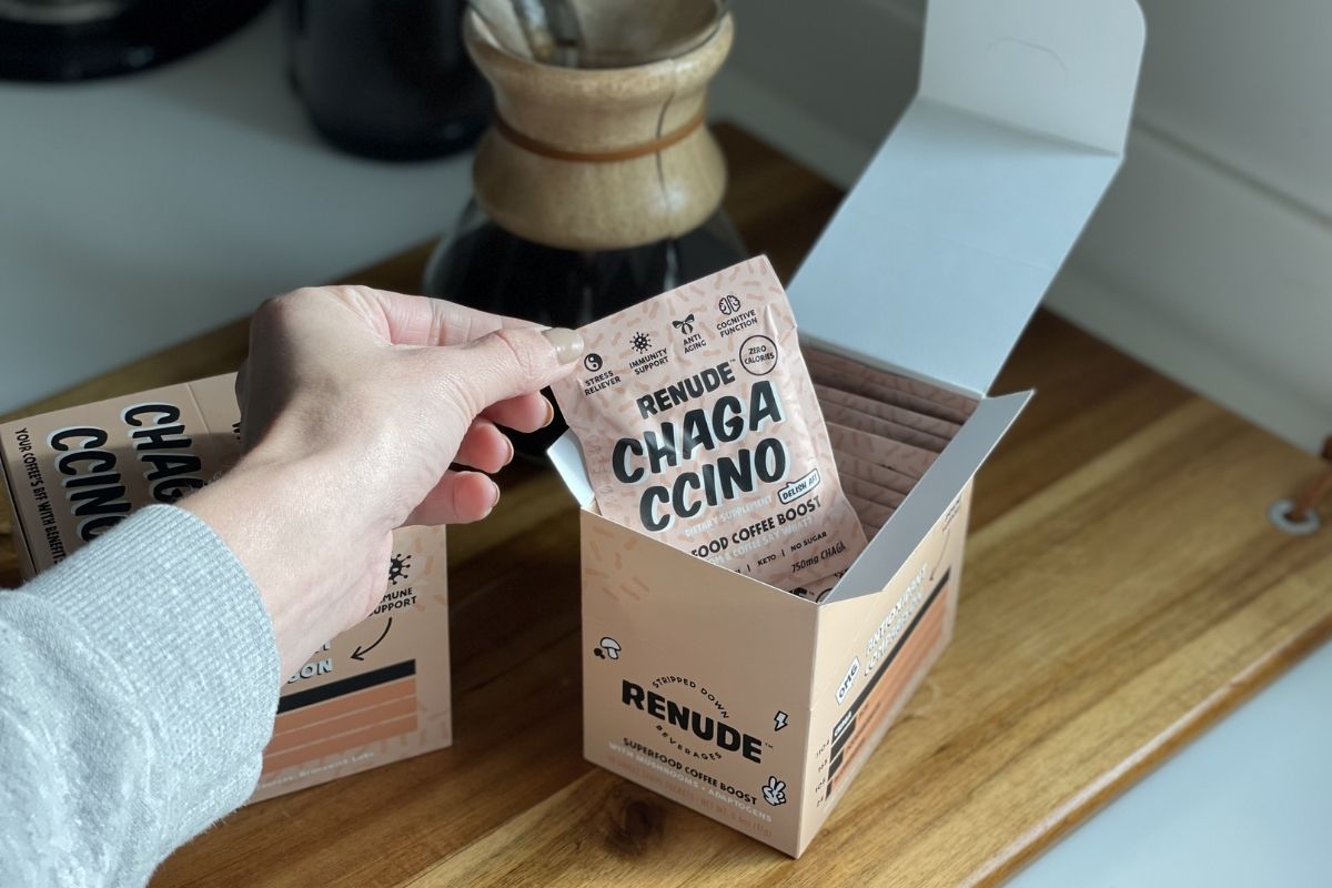 taking a mushroom coffee packet out of box