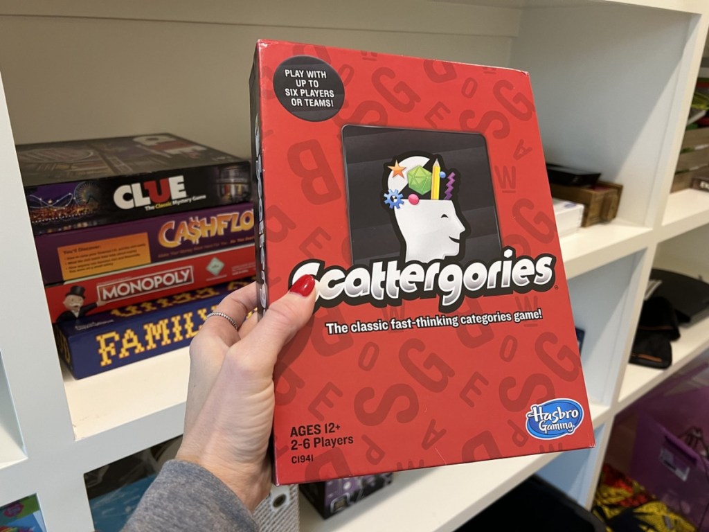 holding Scattergories board game