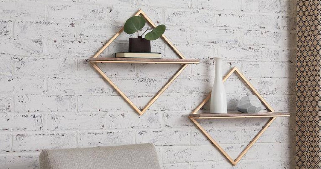 2 triangle shelves hanging on wall
