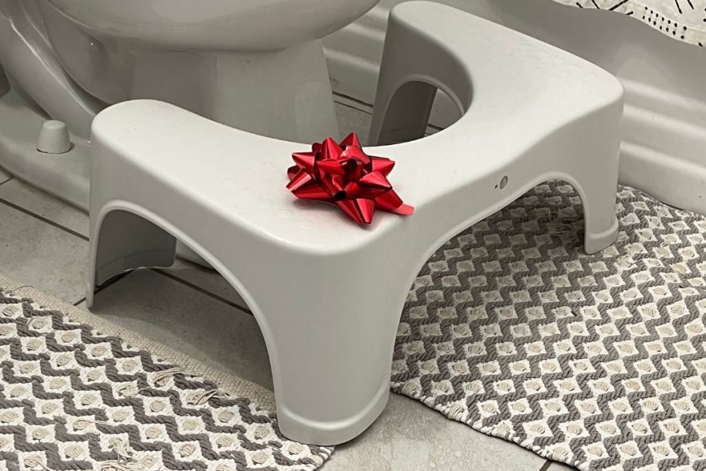 Squatty Potty with a red bow