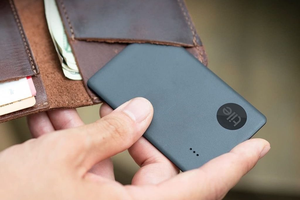 putting a Tile Tracker Slim into a wallet