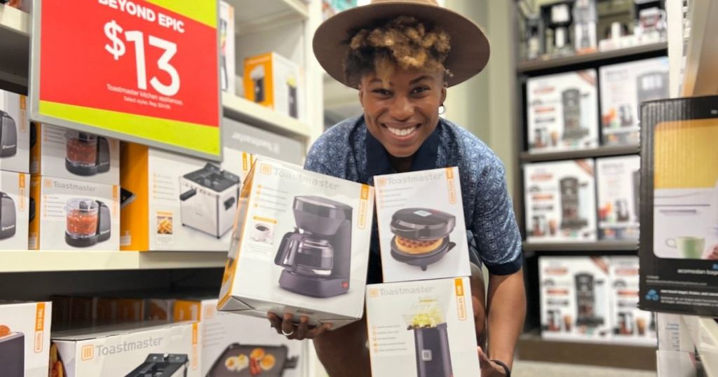 woman holding toastmaster appliances