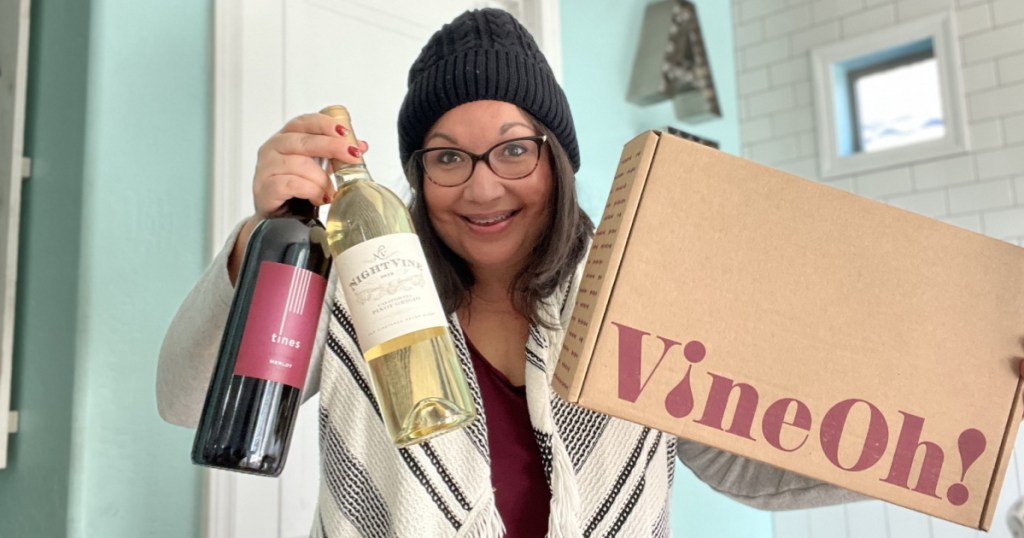 woman holding vineoh! box with wine