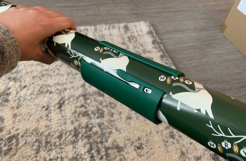 wrapping paper roll with cutter on middle