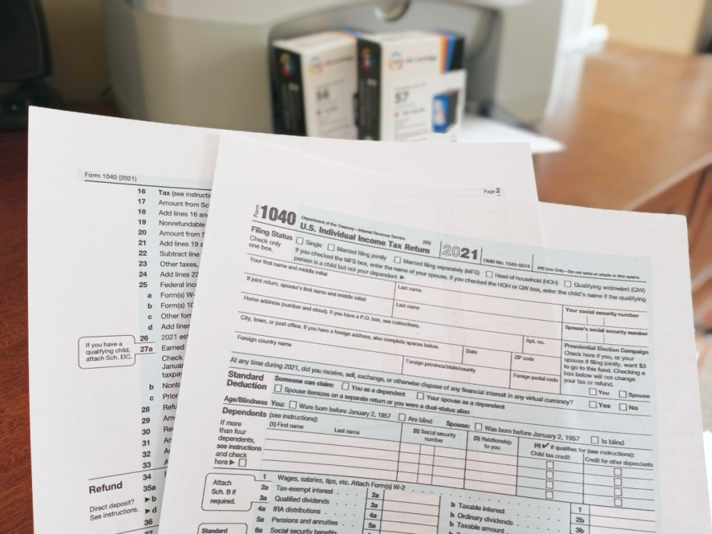 holding 2 1040 tax forms