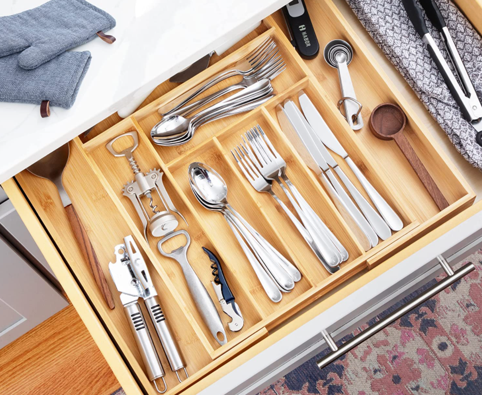 drawer organizer with flatware in it