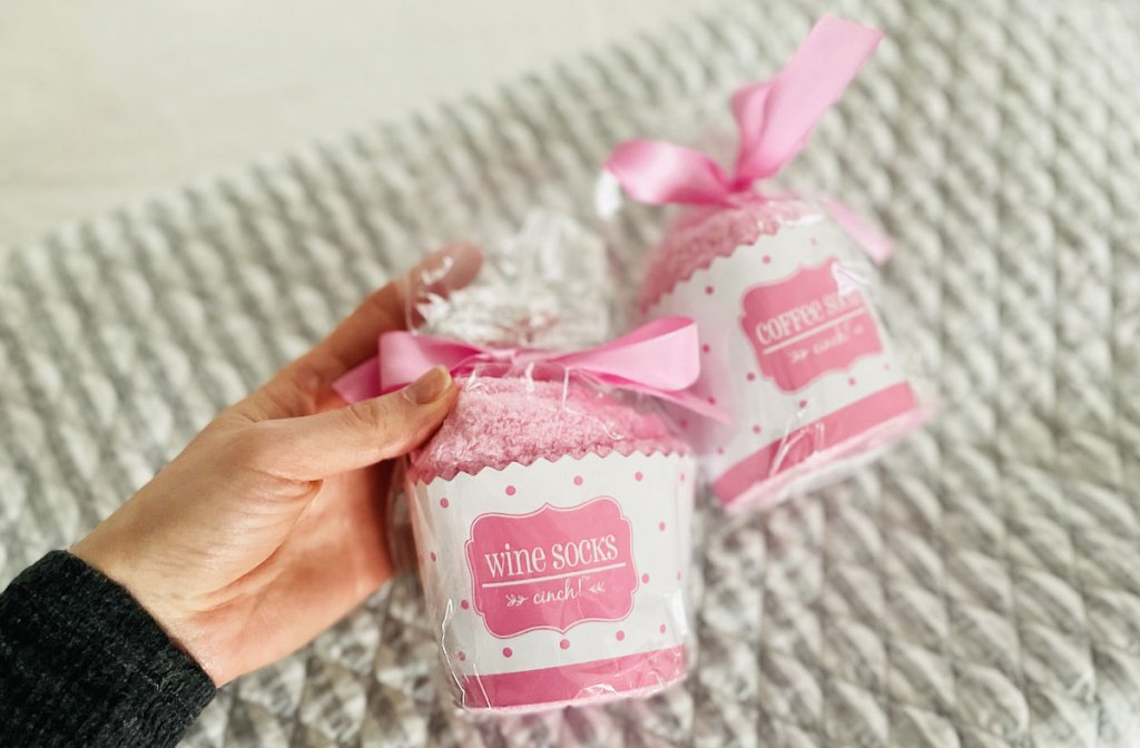 pink socks in cupcake packaging
