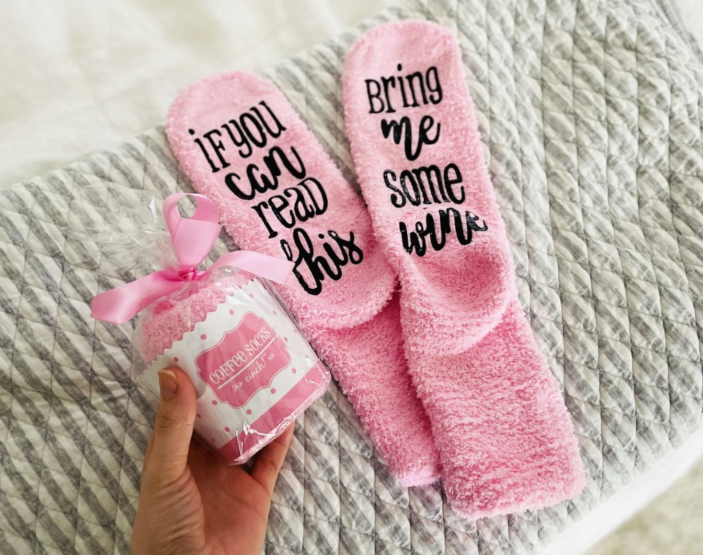 holding packaging for pink fuzzy socks