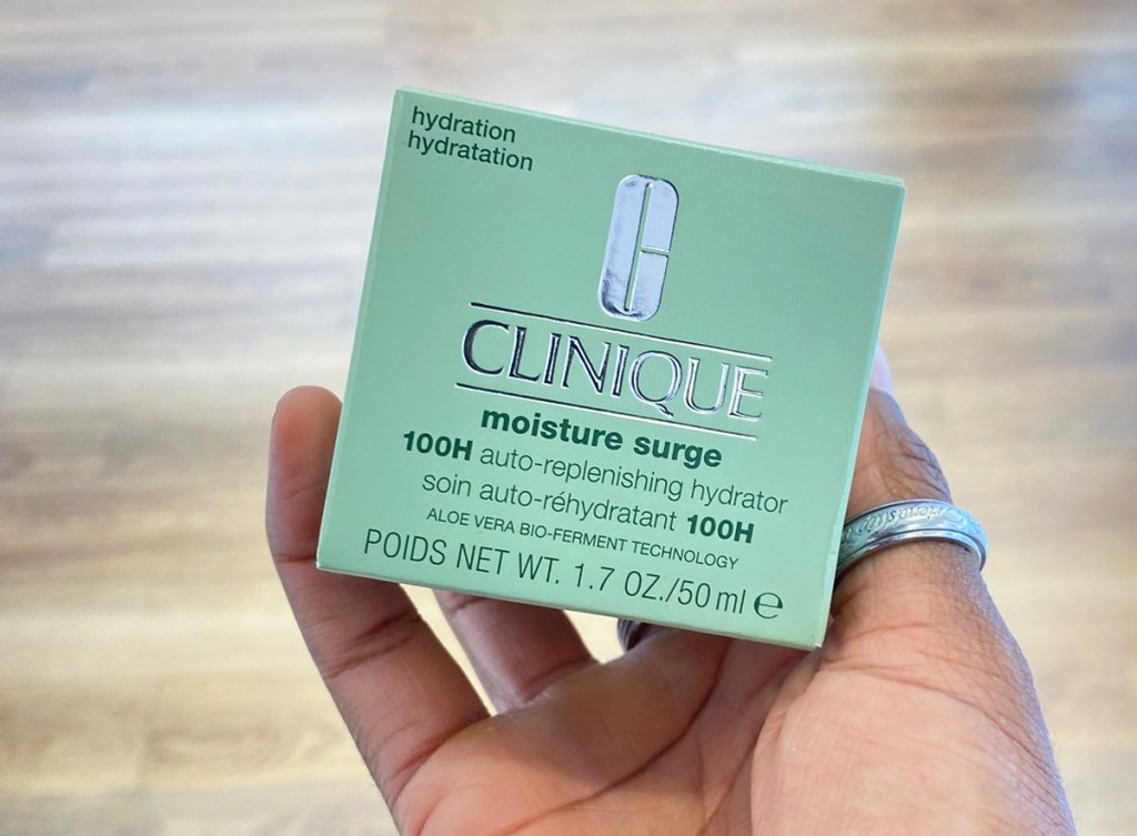 holding clinique moisturizer box