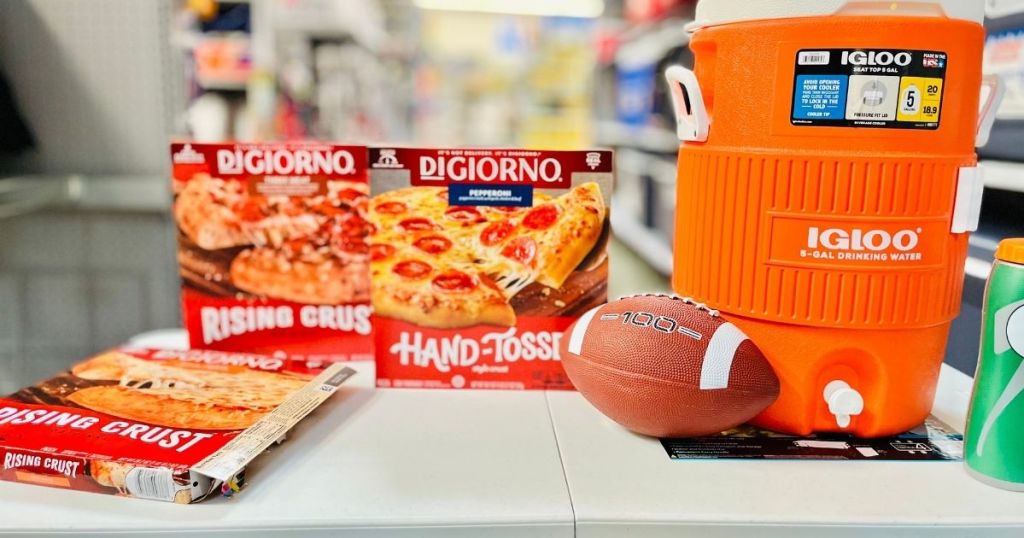 Digiorno Rising Crust pizzas and cooler and football on table