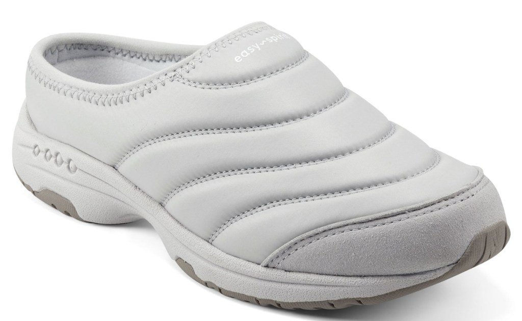 white clog style shoe sitting on white background