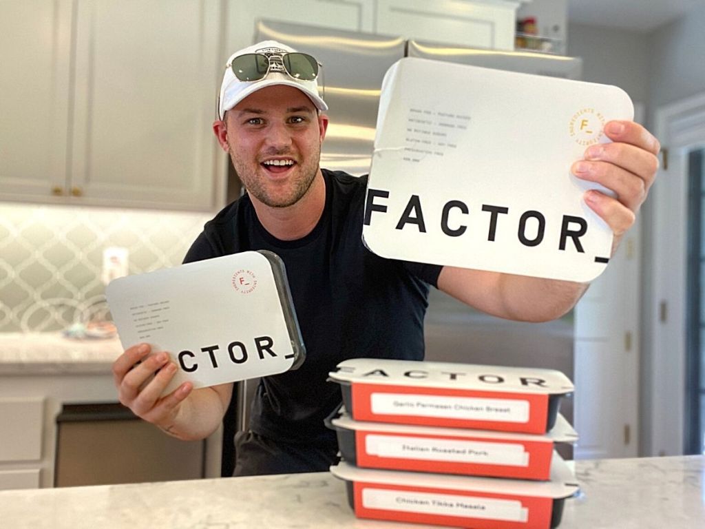man holding Factor meals box